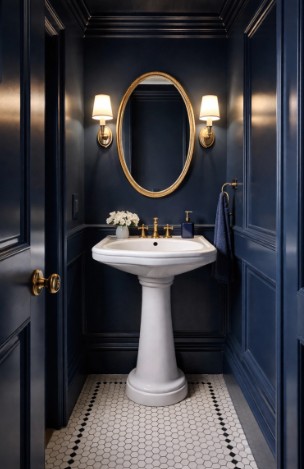 Small powder room transformed with deep navy color drenching technique